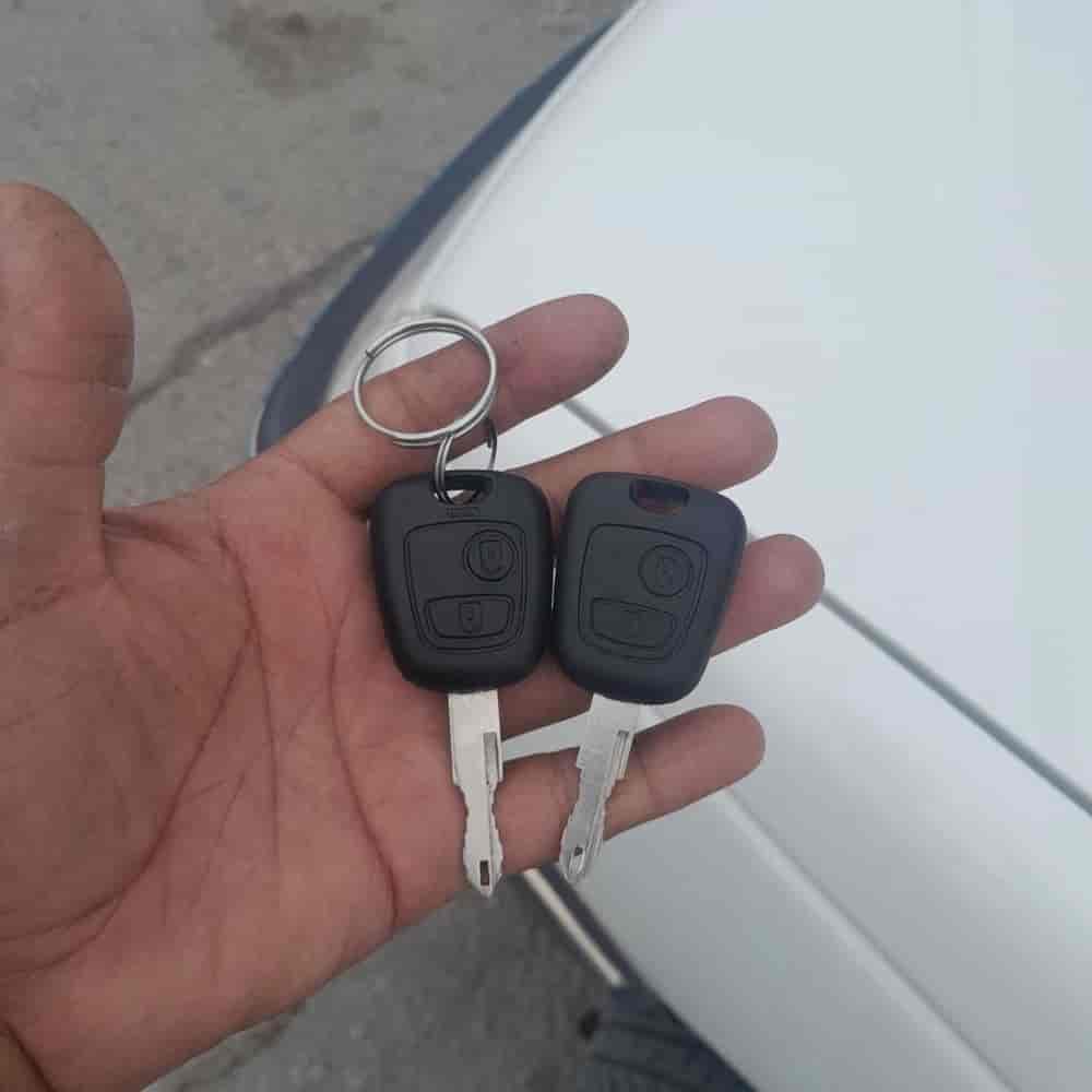 ساخت ریموت و چیپ وکلید یدک پژو slx